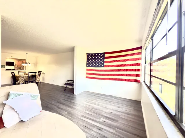 a view of livingroom with furniture and wooden floor