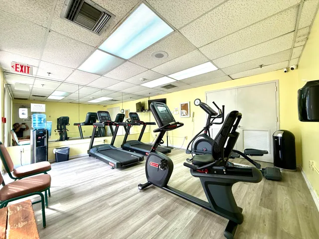 a view of a room with gym equipment