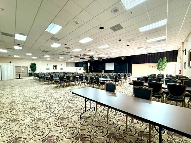 a living room with lots of furniture and a rug