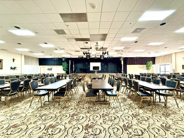 a living room with lots of furniture and a flat screen tv