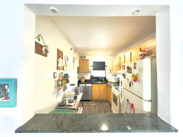 a view of a living room with furniture