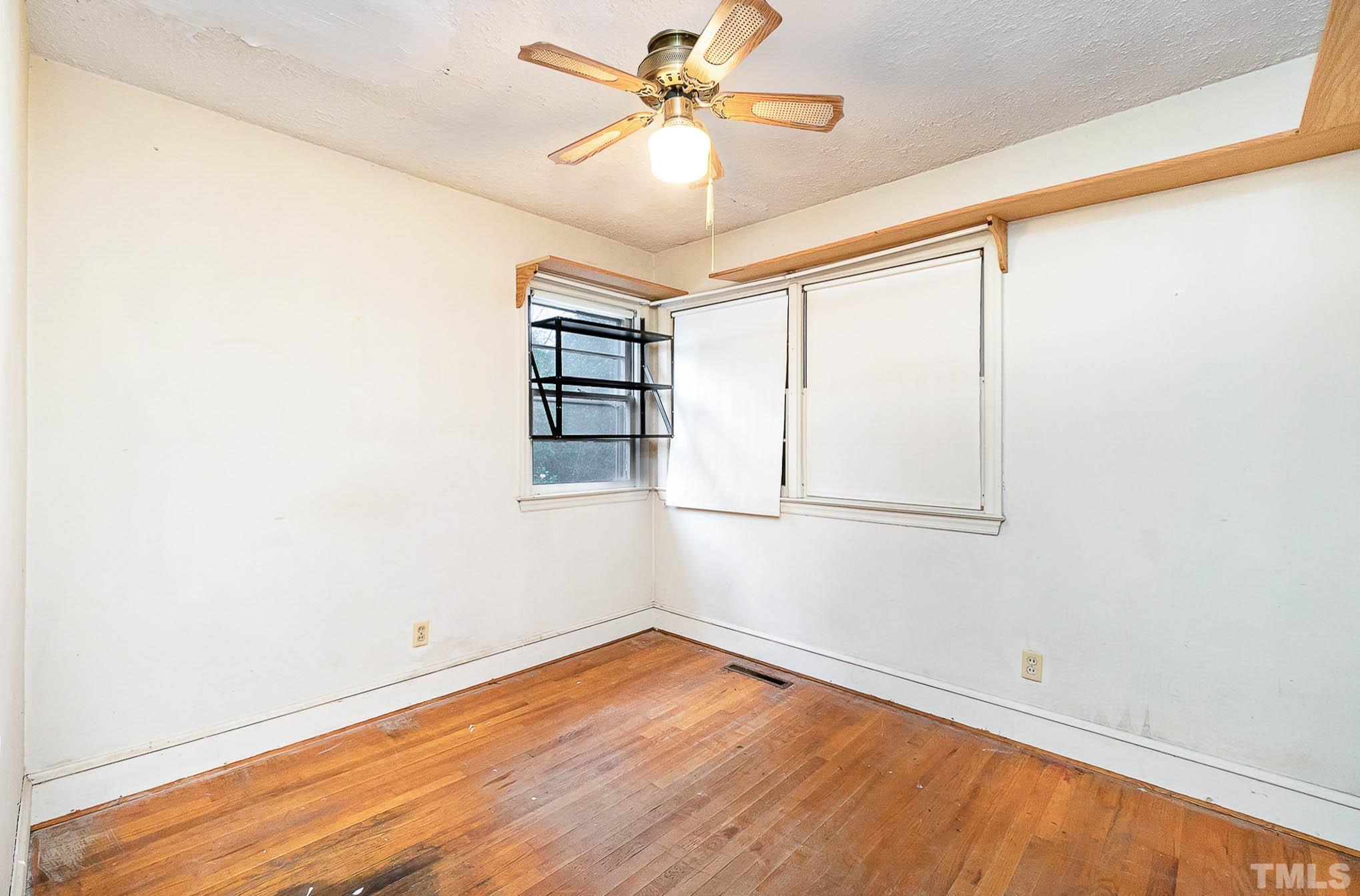 4874 Cameron Road Hope Mills, NC 28348 - Photo 15 of 21 a view of a room with window and a ceiling fan