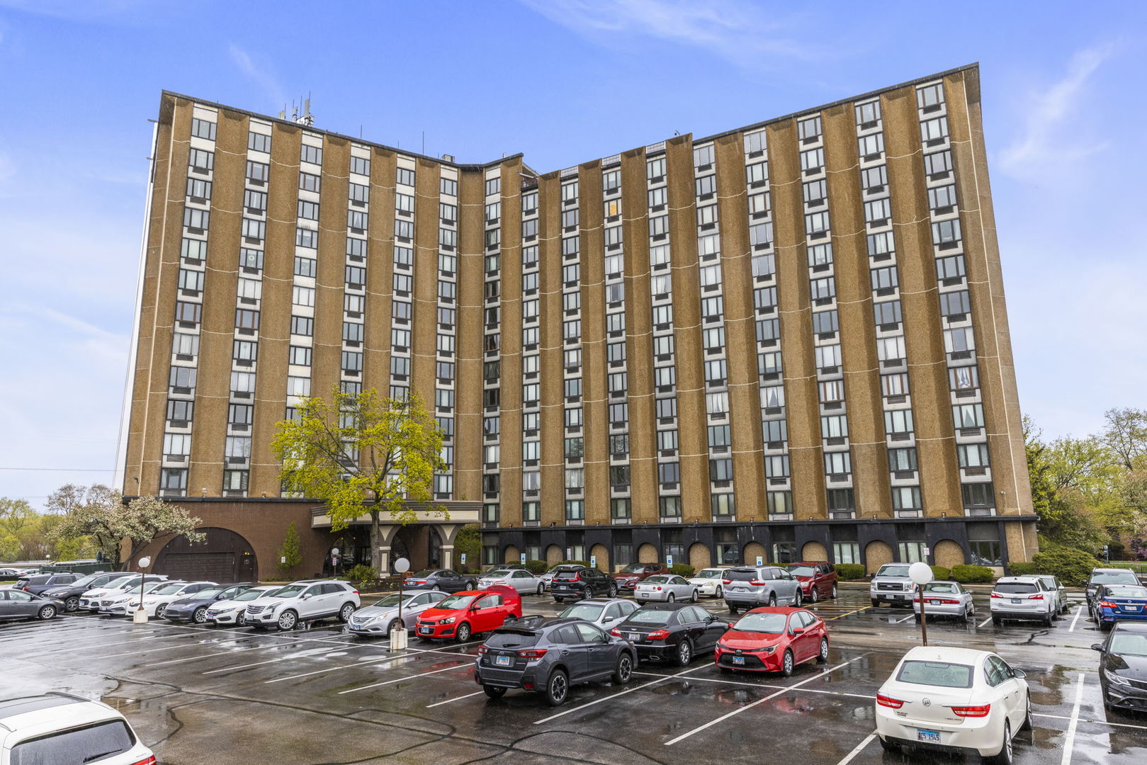 a city street lined with lots of tall buildings