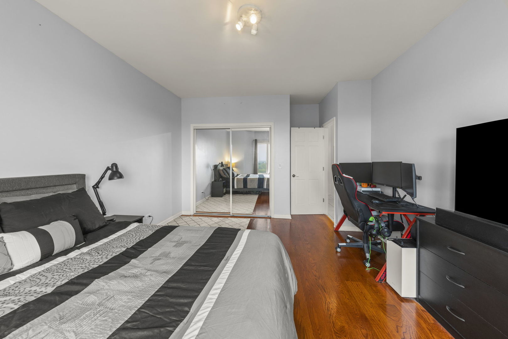 1 Renaissance Place, Unit PH2 Palatine, IL 60067 - Photo 13 of 23 a living room with furniture and a flat screen tv