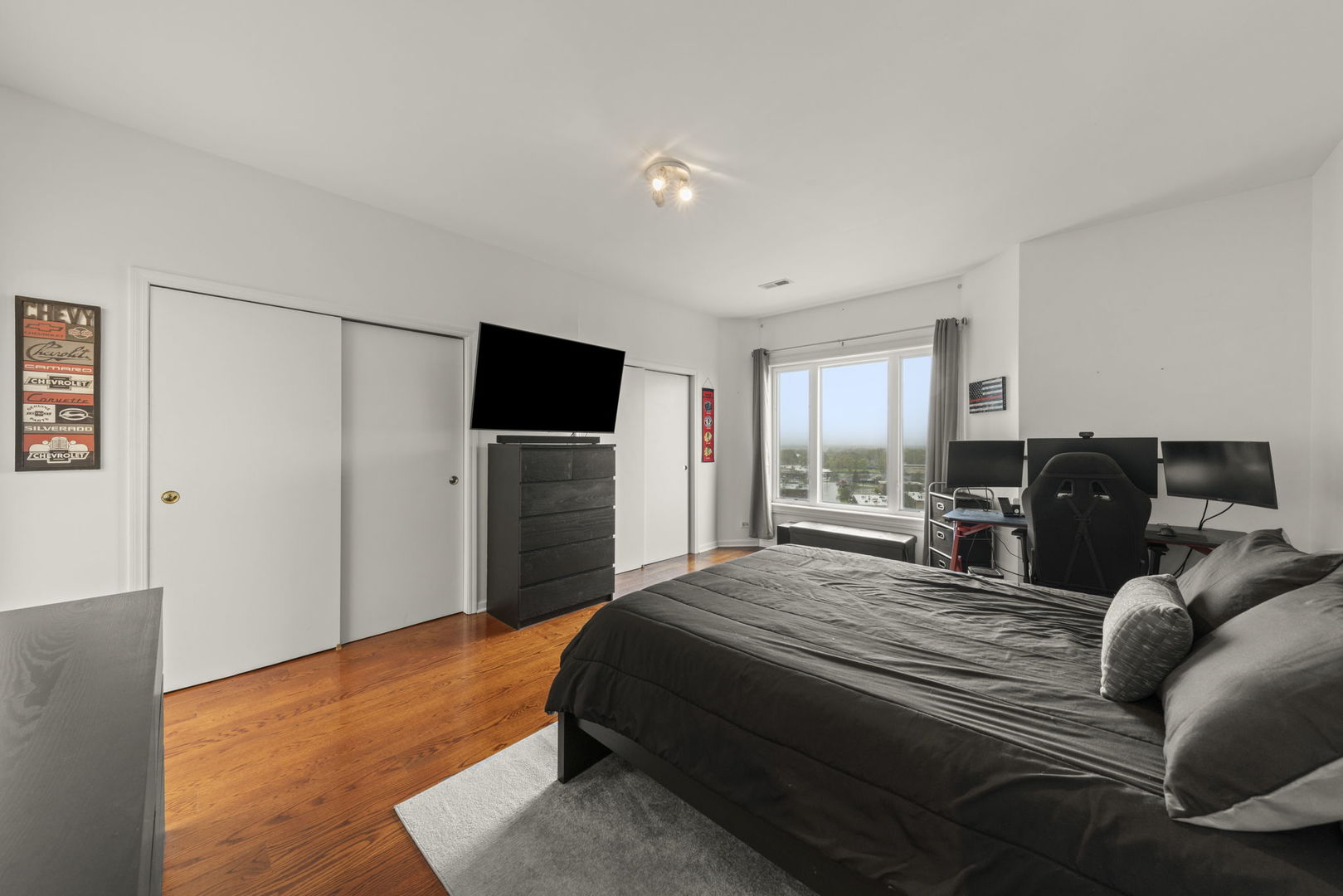 1 Renaissance Place, Unit PH2 Palatine, IL 60067 - Photo 16 of 23 a bedroom with a bed and a television