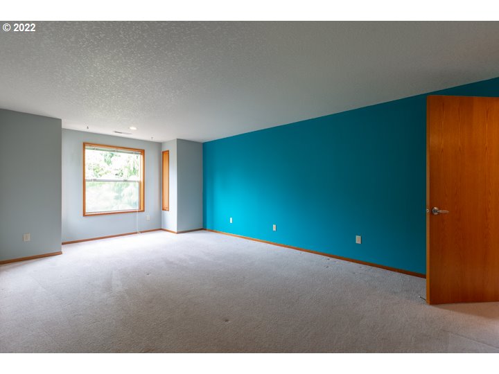 15917 Northeast Union Road, Unit 29 Ridgefield, WA 98642 - Photo 18 of 31 a view of an empty room with a window