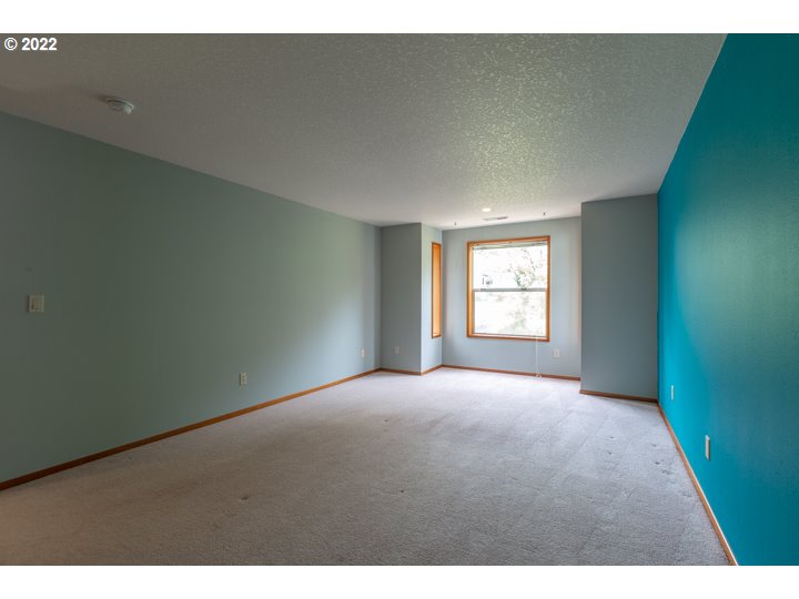 15917 Northeast Union Road, Unit 29 Ridgefield, WA 98642 - Photo 19 of 31 a view of an empty room with a window