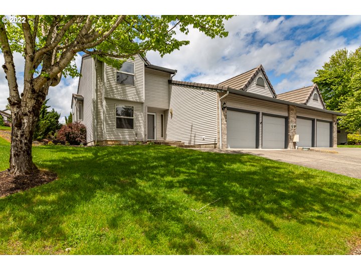 15917 Northeast Union Road, Unit 29 Ridgefield, WA 98642 - Photo 2 of 31 a house view with a garden space