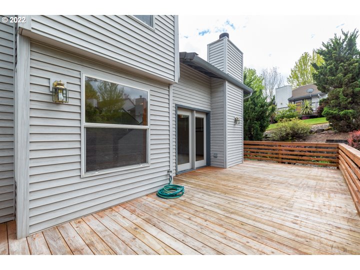15917 Northeast Union Road, Unit 29 Ridgefield, WA 98642 - Photo 30 of 31 a view of a house with a wooden deck