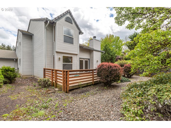 15917 Northeast Union Road, Unit 29 Ridgefield, WA 98642 - Photo 31 of 31 a backyard of a house with a garden and barbeque oven