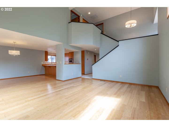 15917 Northeast Union Road, Unit 29 Ridgefield, WA 98642 - Photo 6 of 31 a view of empty room with wooden floor