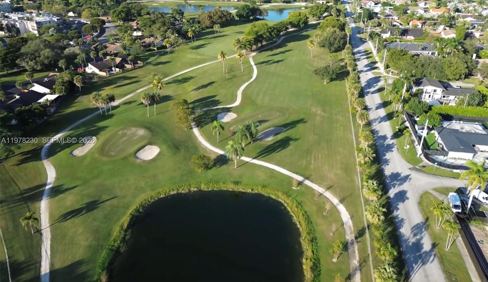 9151-sw 128 St Miami, FL 33176 - Photo 13 of 13 an aerial view of a swimming pool