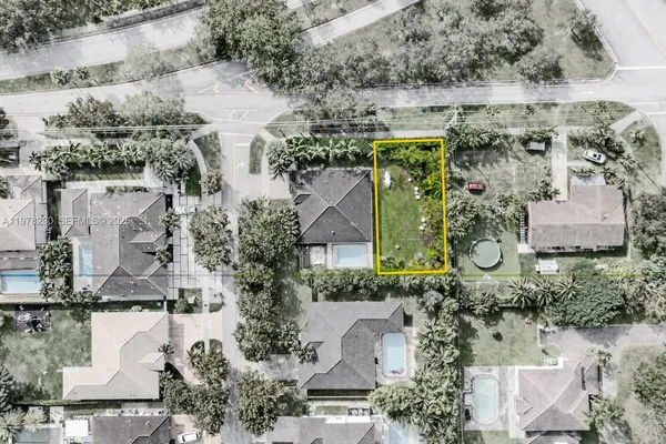 an aerial view of a house with outdoor space