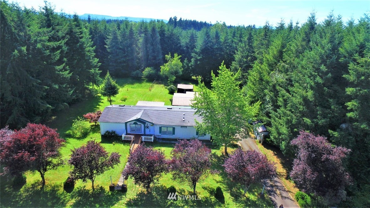 120 Bowers Road Chehalis, WA 98532 - Photo 1 of 31 a view of a garden with a house