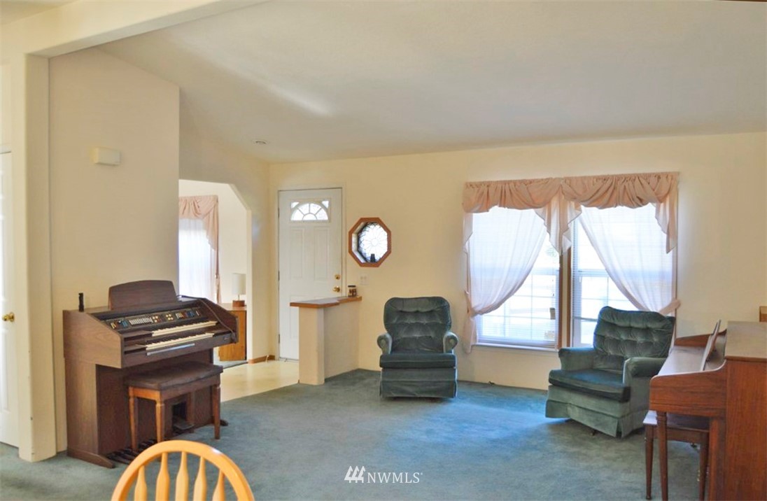 120 Bowers Road Chehalis, WA 98532 - Photo 11 of 31 a view of living room with furniture and a fireplace