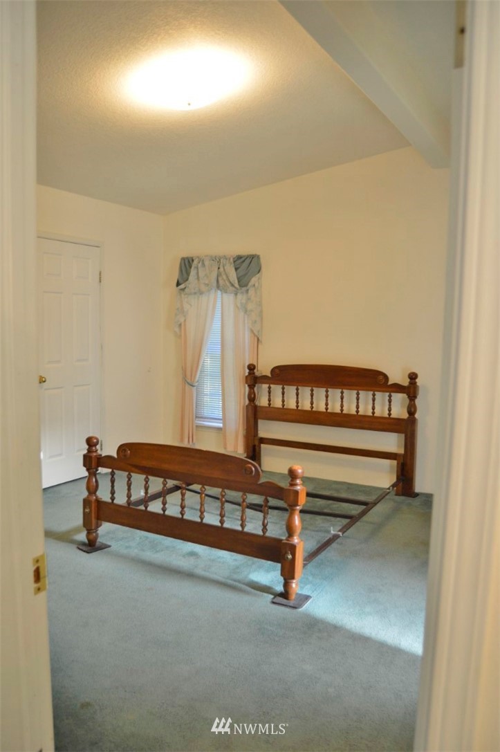 120 Bowers Road Chehalis, WA 98532 - Photo 14 of 31 a spacious bedroom with a bed and a dresser in it