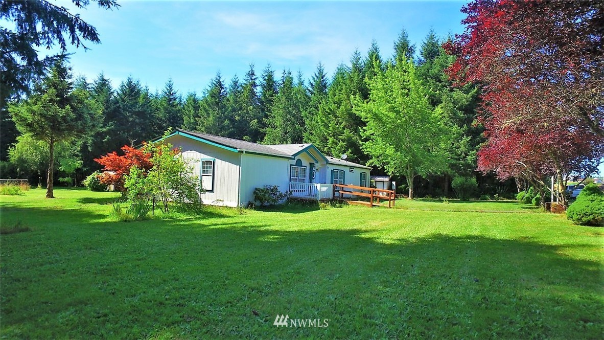 120 Bowers Road Chehalis, WA 98532 - Photo 27 of 31 a front view of house with a garden and trees