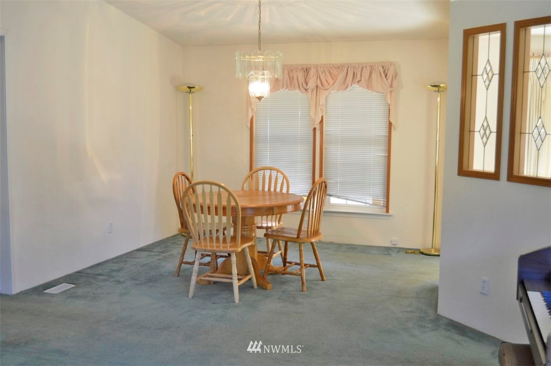 120 Bowers Road Chehalis, WA 98532 - Photo 5 of 31 a view of a dining room with furniture window and outside view