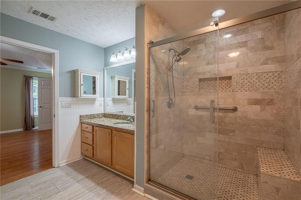 245 Memory Lane Winder, GA 30680 - Photo 30 of 62 a bathroom with a shower and a sink