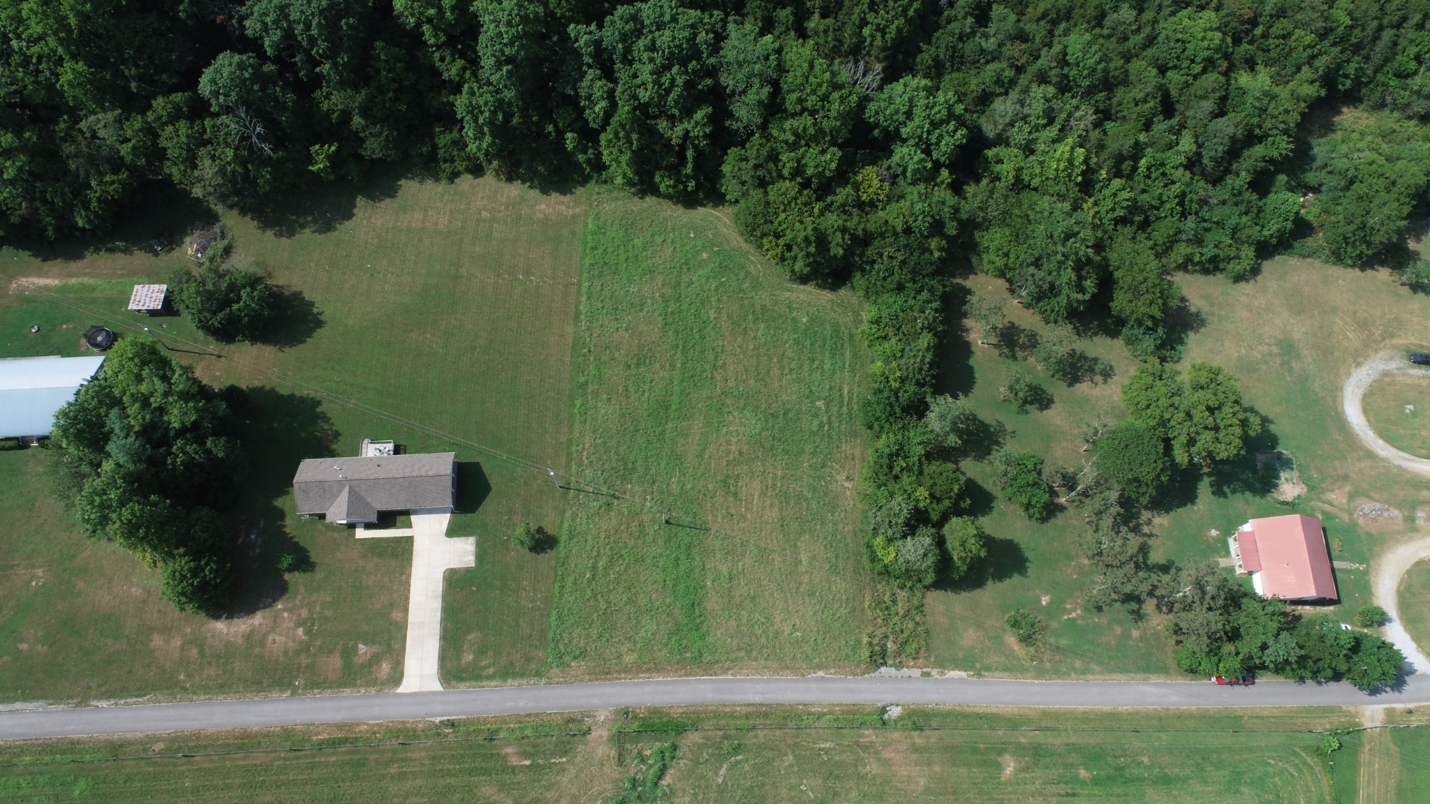 0 McClanahan Road Hartsville, TN 37074 - Photo 6 of 11 an aerial view of residential house with outdoor space