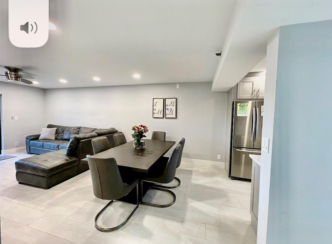 9235 Southwest 8th Street, Unit 207 Boca Raton, FL 33428 - Photo 4 of 24 a living room with furniture
