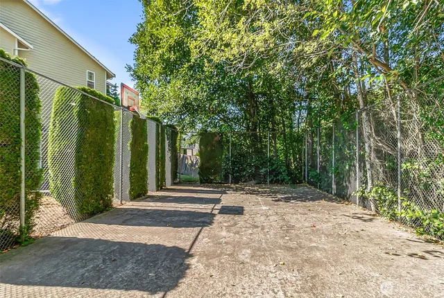 a backyard of a house with lots of green space