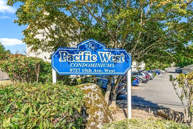 a sign broad on the side of the road