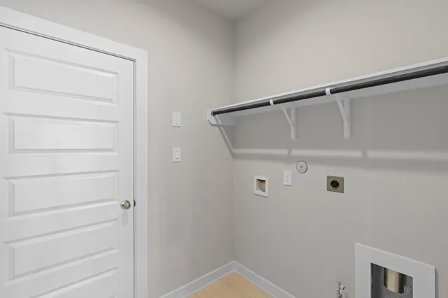 a view of a house with a yard and a porch