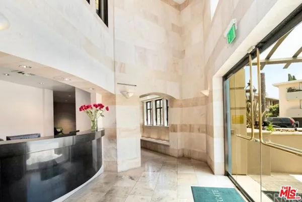 a view of an entryway with a living room