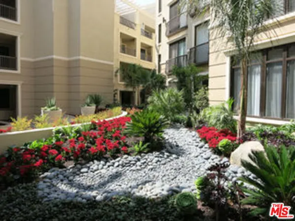 a balcony view with an outdoor space