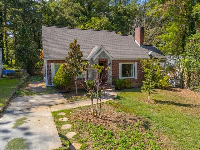 a house with trees in the background
