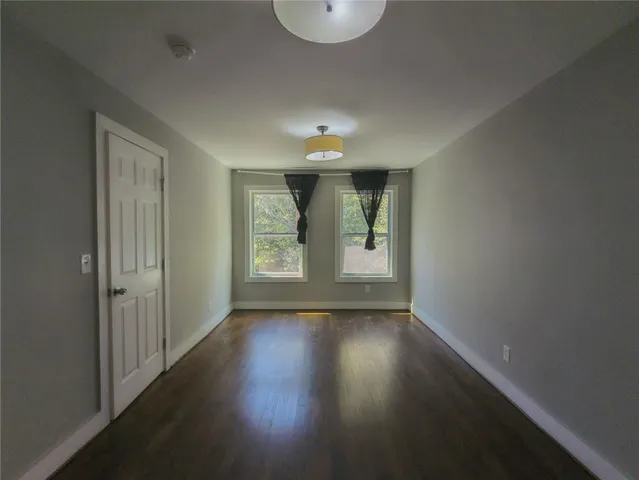 a view of an empty room and window