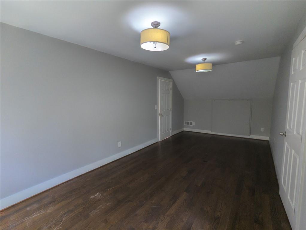 1261 Eastridge Road Southwest Atlanta, GA 30311 - Photo 21 of 36 a view of an empty room and window