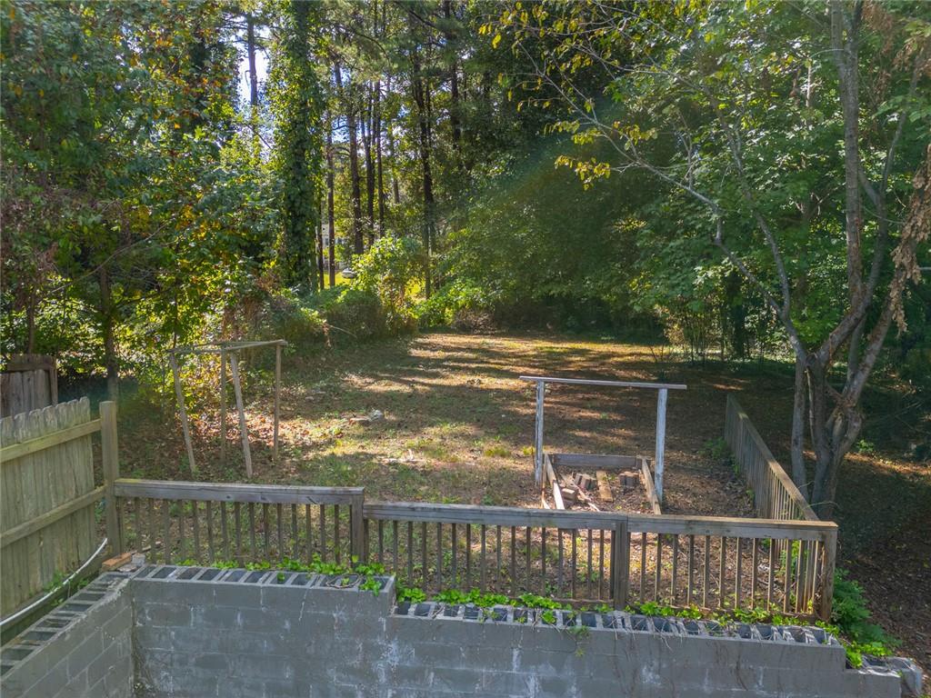 1261 Eastridge Road Southwest Atlanta, GA 30311 - Photo 27 of 36 a view of a wooden bridge
