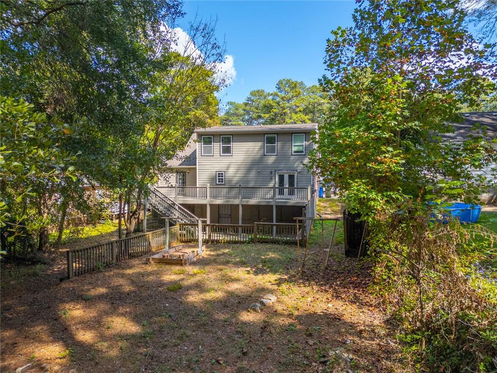 1261 Eastridge Road Southwest Atlanta, GA 30311 - Photo 30 of 36 a view of house with a yard