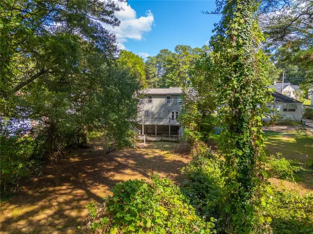 a view of a room with a large window