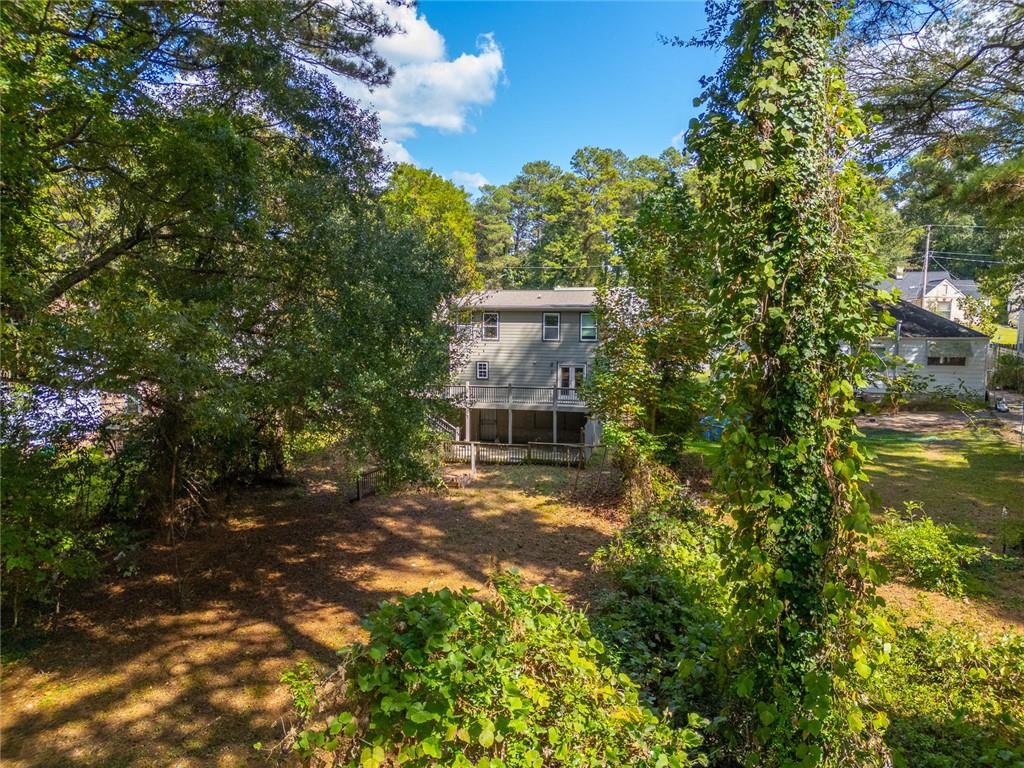 1261 Eastridge Road Southwest Atlanta, GA 30311 - Photo 32 of 36 a view of a house with a tree