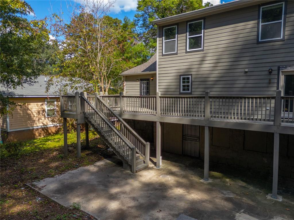 1261 Eastridge Road Southwest Atlanta, GA 30311 - Photo 36 of 36 a view of house with roof deck and chair