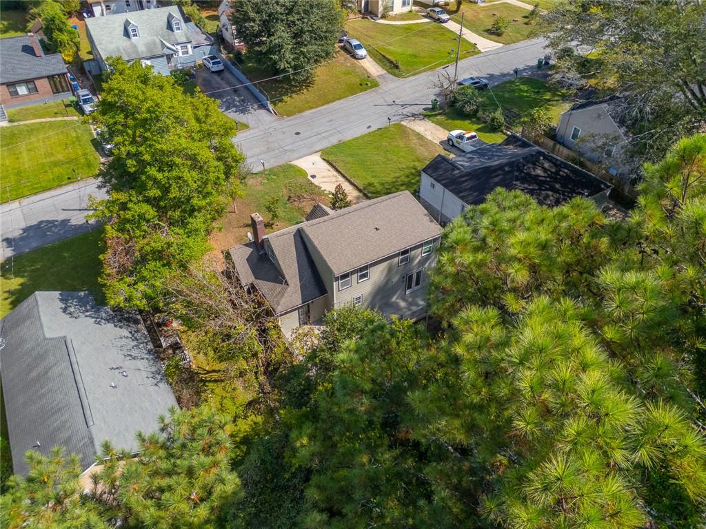 1261 Eastridge Road Southwest Atlanta, GA 30311 - Photo 5 of 36 an aerial view of a house with a yard and garden