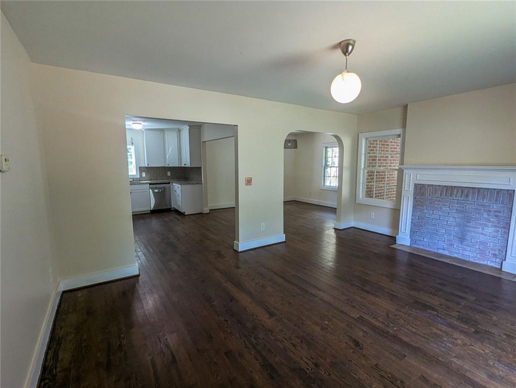 1261 Eastridge Road Southwest Atlanta, GA 30311 - Photo 8 of 36 a view of a house and wooden floor