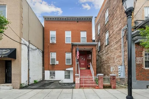 a front view of a multi story residential apartment building