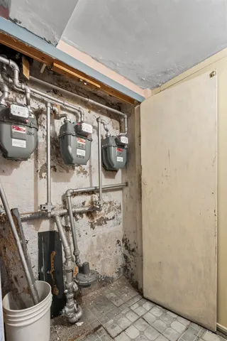 a bathroom with a window and a shower