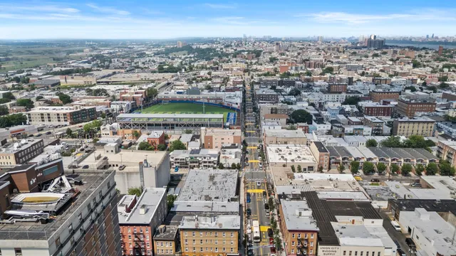 an aerial view of a city with lots of residential buildings