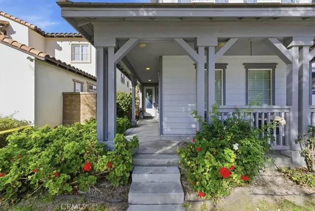 a lobby with furniture and glass door