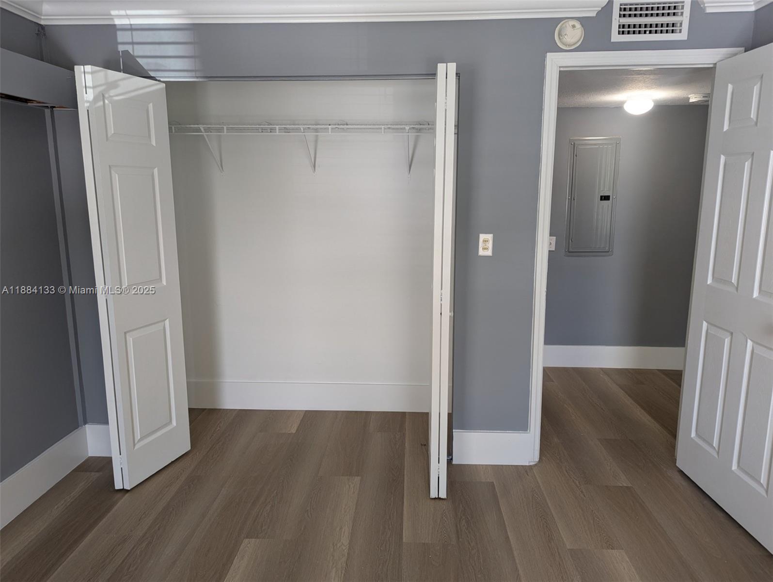 13700 Southwest 62nd Street, Unit 204 Miami, FL 33183 - Photo 13 of 30 a view of a hallway with wooden floor