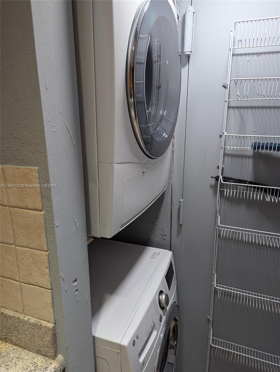 13700 Southwest 62nd Street, Unit 204 Miami, FL 33183 - Photo 24 of 30 a utility room with dryer and washer