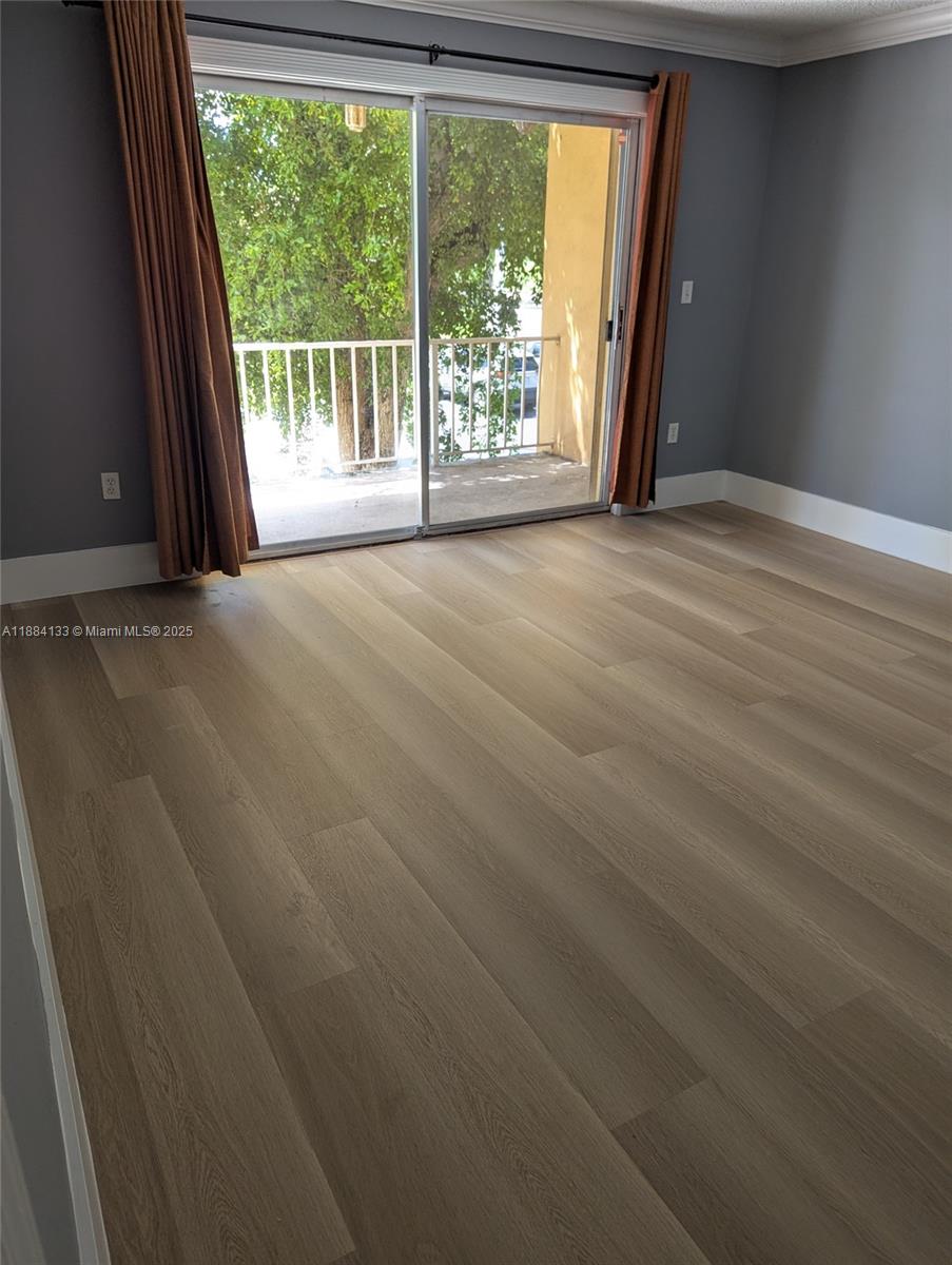 13700 Southwest 62nd Street, Unit 204 Miami, FL 33183 - Photo 4 of 30 a view of a room with a large window