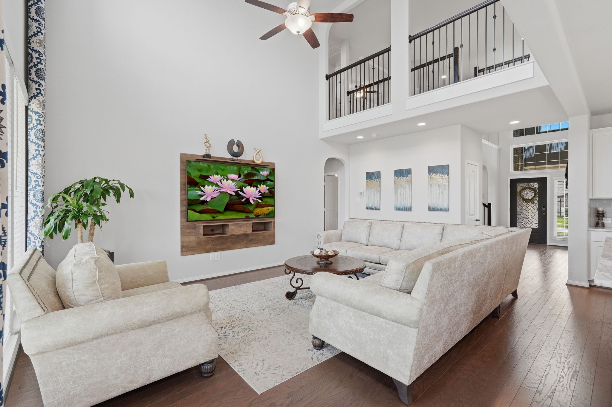 7522 Windsor View Drive Spring, TX 77379 - Photo 9 of 49 Spacious main living area with an open feel and plenty of room to gather and relax.