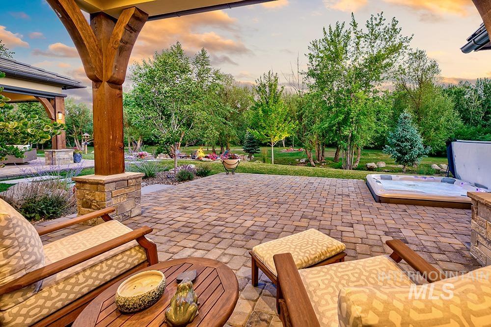 1582 East Rivers End Court Eagle, ID 83616 - Photo 22 of 49 View of patio / terrace featuring a gazebo and a hot tub