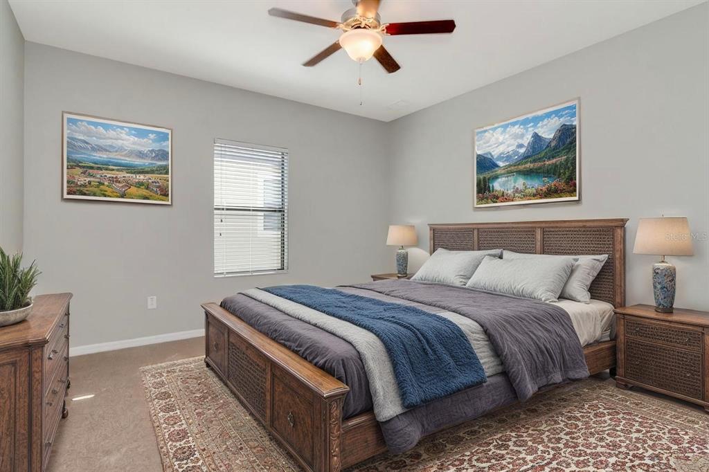 13939 Felix Will Road Riverview, FL 33579 - Photo 16 of 47 a bedroom with bed and a window